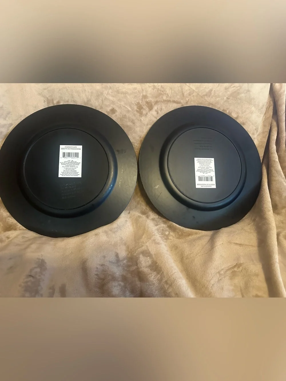 Set of 2 metallic brown plate chargers.